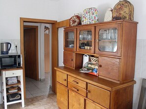 Apartamento | Cozinha privada | Cadeirão de bebê