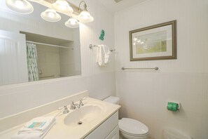 Bathtub, hair dryer, towels