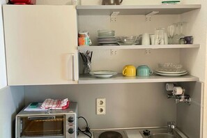 Apartment | Private kitchen | Fridge, oven - Compact Apartment in Bad Herrenalb With Forest Views (Bad Herrenalb)