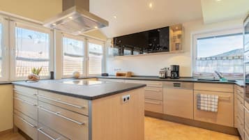 Apartamento | Cozinha privada | Cadeirão de bebê