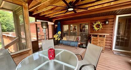 Lakefront cabin on Bass Lake near Traverse City. Pets ok. Fire pit. Grill.