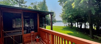 Lakefront cabin on Bass Lake near Traverse City. Dog ok. Fire pit. Grill.