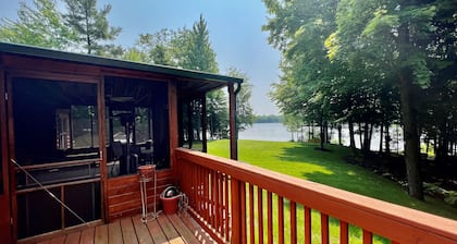 Lakefront cabin on Bass Lake near Traverse City. Dog ok. Fire pit. Grill.