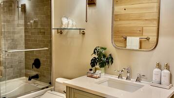 Shower, jetted tub, hair dryer, bidet