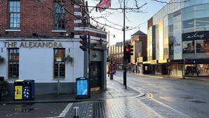 A street view with a building labeled "The Alexandra" featuring a white facade, a visible entrance, and a sign indicating a nearby Christian Science Church. - Beautiful 1-bed Apartment in Wimbledon- London (London)