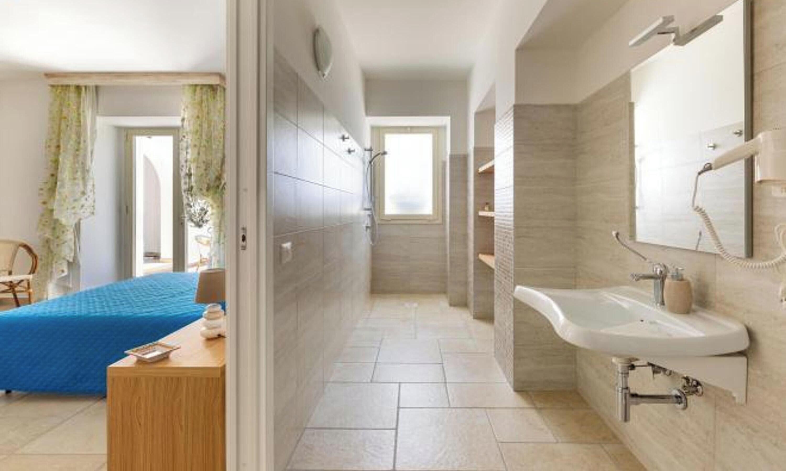 Un baño moderno con un lavamanos grande, un espejo y una ducha.