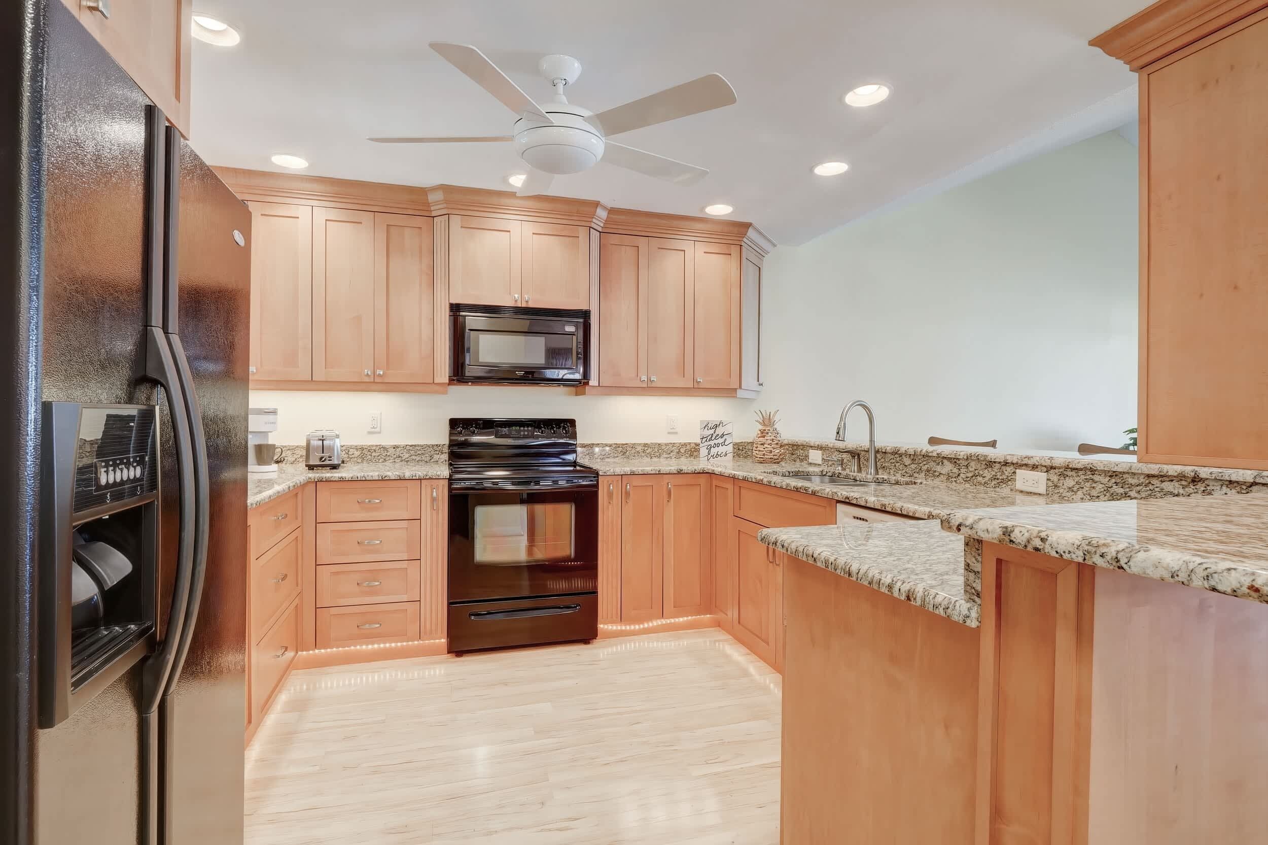 Coffee/tea maker, fridge, microwave, oven