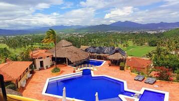 Outdoor pool, pool umbrellas, pool loungers