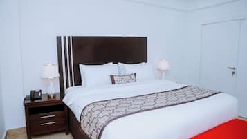 Premium bedding, down duvets, desk, laptop workspace