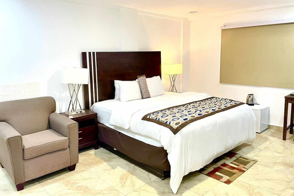 Economy Room, 1 Bedroom | 1 bedroom, down comforters, desk, soundproofing