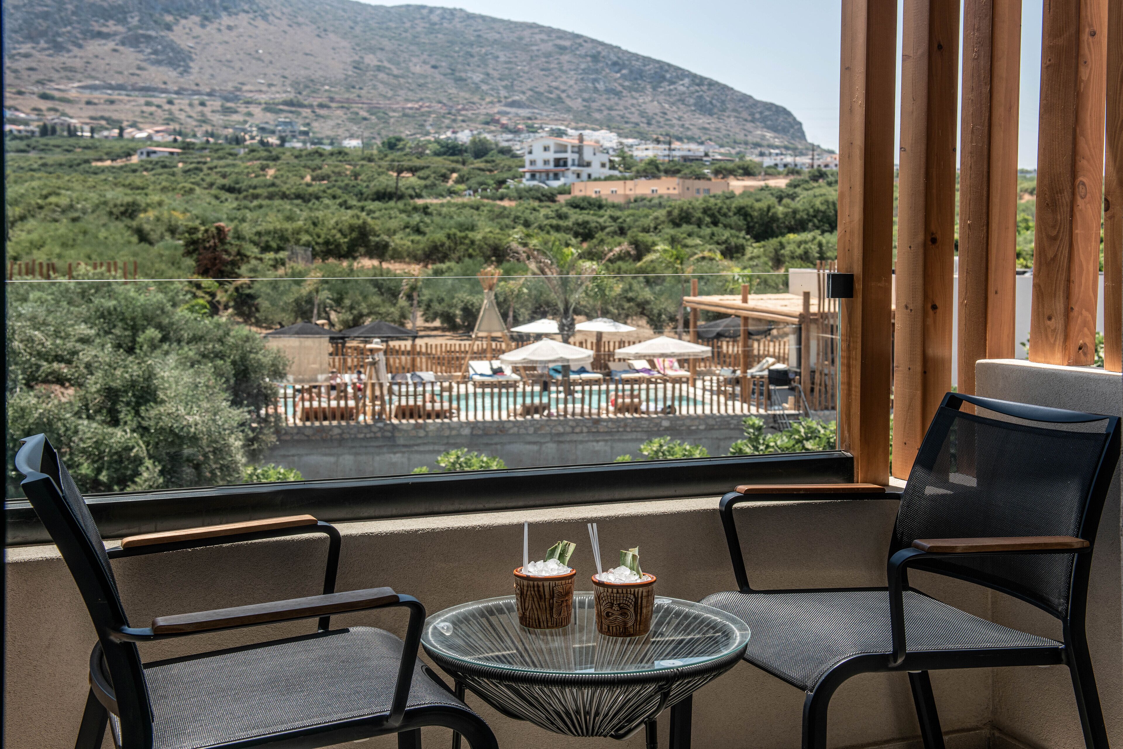 Deluxe Double Room Pool View | In-room safe, blackout drapes, soundproofing, iron/ironing board