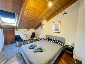4 bedrooms, down comforters, blackout drapes, iron/ironing board
