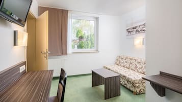 Junior Suite | 1 bedroom, desk, blackout drapes, free WiFi