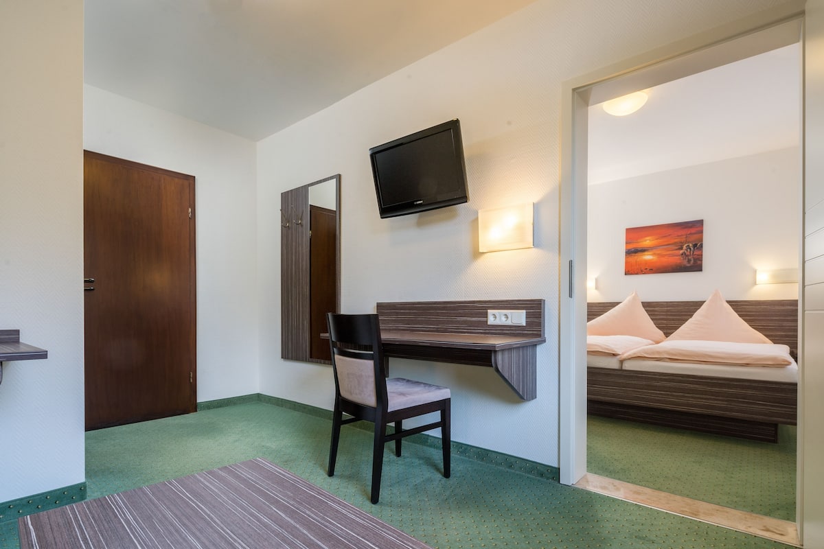Junior suite | 1 slaapkamer, een bureau, verduisterende gordijnen, gratis wifi