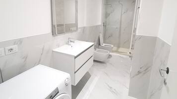 Departamento | Baño | Regadera, regadera tipo lluvia, secadora de cabello, bidet