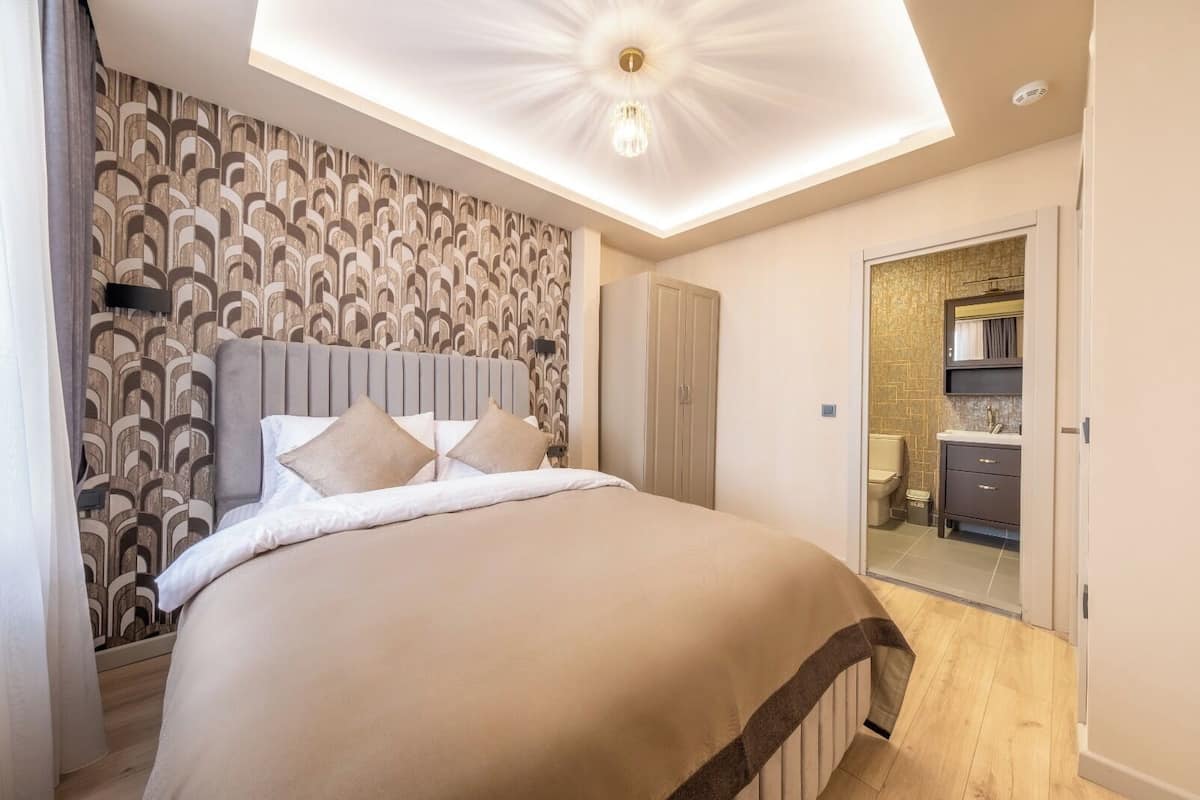 Presidential-Apartment | 1 Schlafzimmer, hochwertige Bettwaren, Betten mit Memory-Foam-Matratzen