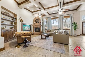 TV, fireplace, books, stereo