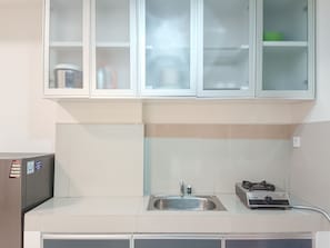 Appartement Deluxe | Cuisine privée | Réfrigérateur grande capacité avec congélateur, surface de cuisson