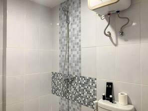 Appartamento Deluxe | Bagno | Doccia, asciugamani