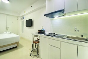 Living area - Modern Design And Cozy Studio At Bassura City Apartment (Jakarta)