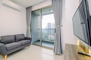 Deluxe Apartment | Living area - Stunning And Cozy 1Br Apartment At Ciputra World 2 (Jakarta)