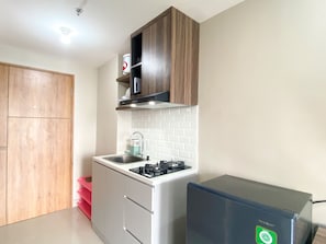 Private kitchen - Well Furnished and Cozy Studio at LRT City Jatibening Apartment (Bekasi)