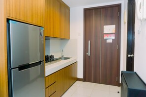 Deluxe Apartment | Private kitchen - Warm And Minimalist 1Br Apartment At Scientia Residence (Gading Serpong)