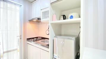 Apartamento luxo | Cozinha privada | Geladeira grande, cooktop, panela elétrica de arroz