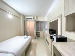 Deluxe Apartment | Living area - Comfortable Studio Apartment For 1 Pax Grand Sentraland Karawang (Karawang)