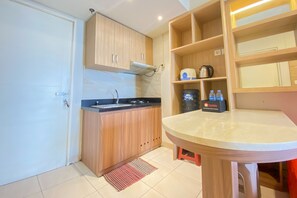 Deluxe Apartment | Private kitchen - Best Homey And Nice 2Br At Springalake Summarecon Bekasi Apartment (Bekasi)
