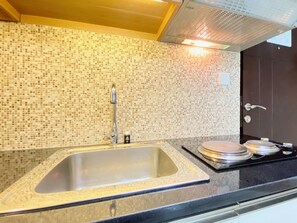 Deluxe Apartment | Private kitchen - Cozy 1Br At Tamansari La Grande Apartment (Bandung)