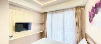 Homey Studio Room At Grand Asia Afrika Apartment