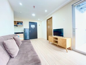 Deluxe Apartment | Living area - Spacious 2Br Apartment At Grand Asia Afrika (Bandung)