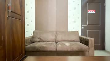 Apartamento Deluxe | Zona de estar