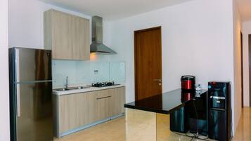 Căn hộ Deluxe | Bếp riêng | Tủ lạnh, bếp nấu