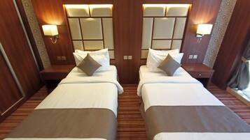 Habitación | 1 habitación, ropa de cama de alta calidad y camas con efecto memoria