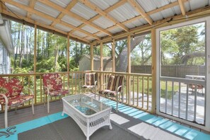 Terrace/patio - Mandolin Wind your family beach getaway. 
5 minute walk to the beach. 10% off (Oak Island)