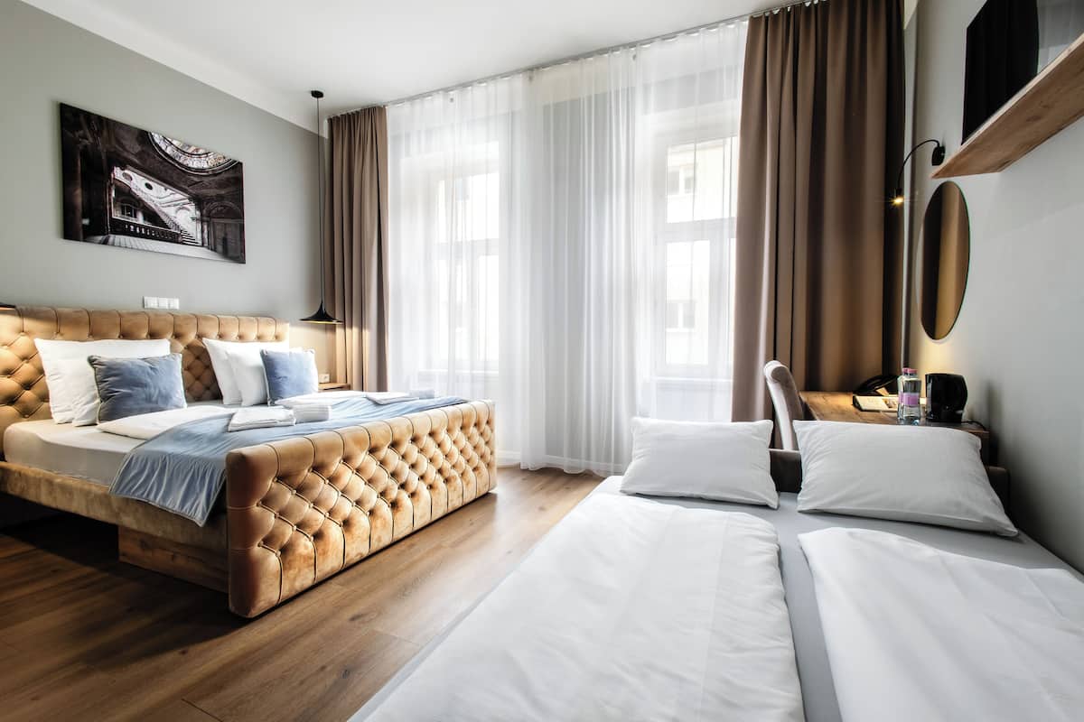 Superior Quadruple Room | In-room safe, individually decorated, individually furnished, desk