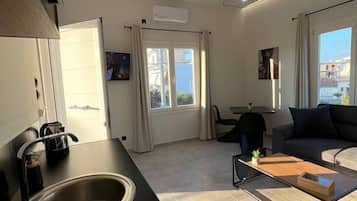 Apartamento superior, 1 habitación | Cocina privada | Frigorífico grande y isla de cocina