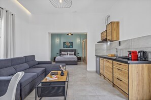 Superior Apartment, 1 Bedroom | Living area | 43-inch Smart TV with digital channels, TV - Elefsinian Mysteries Apartments (Elefsina)