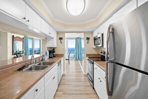 Fridge, microwave, oven, stovetop - Pelican Walk 601 Beach Front Condo! Free Chairs! (Panama City Beach)