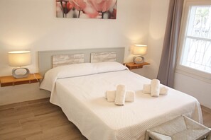 4 habitaciones, tabla de planchar con plancha, wifi y ropa de cama 