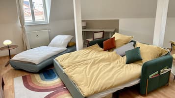 1 bedroom, desk, iron/ironing board, travel crib