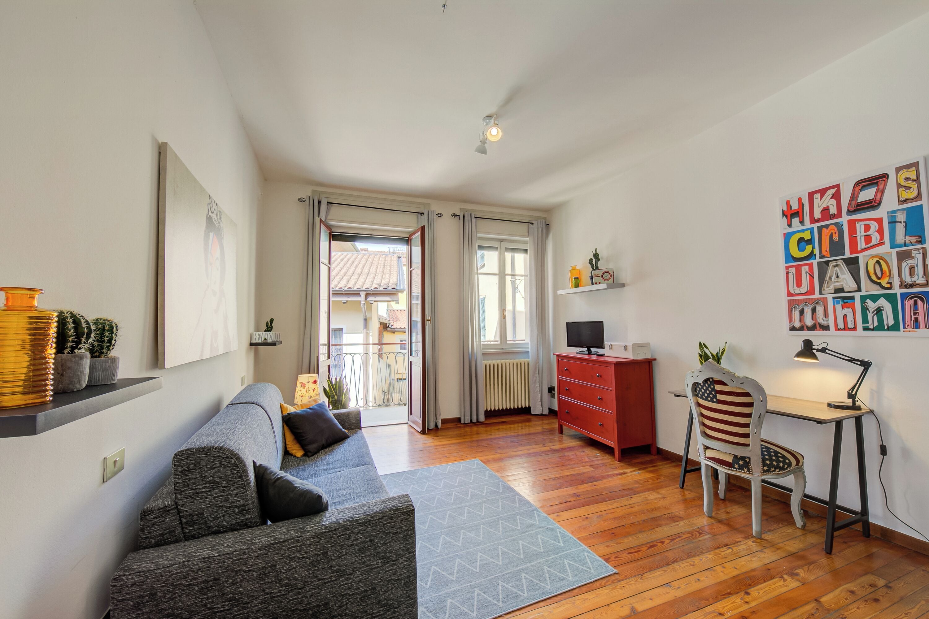 Family Apartment, 2 Bedrooms, Balcony (Casa Rachele Stresa Center) | Living area | 21-inch TV with digital channels