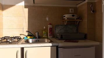 Apartment | Private kitchen | Fridge, stovetop, coffee/tea maker, electric kettle