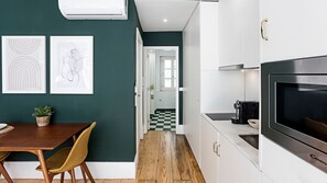 Fridge, stovetop, coffee/tea maker, cookware/dishes/utensils