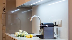 Coffee/tea maker, fridge, microwave, oven