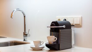 Coffee/tea maker, fridge, microwave, oven