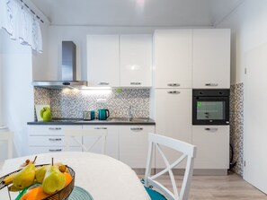 Apartment | Private kitchen | Fridge, microwave, oven, stovetop