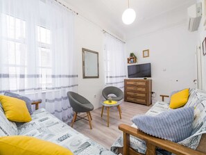 Departamento | Área de sala de estar | Reproductor de DVD 